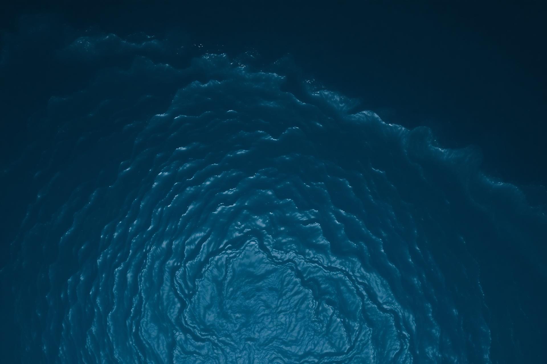Aerial view of dark ocean waves
